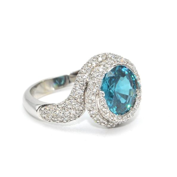 white gold ring with natural zircon and diamonds