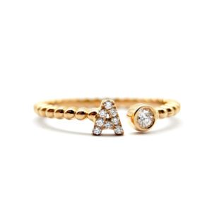 Anello pallini oro rosa lettera A e diamanti