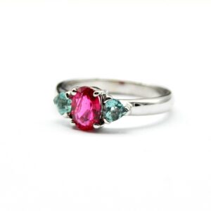 Ring with two heart-cut blue lagoon tourmalines and spinel